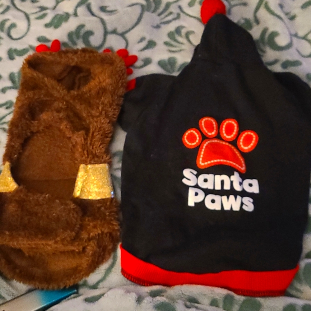 Size small reindeer doggie outfit and small/med Santa shirt.  Excellent shape!